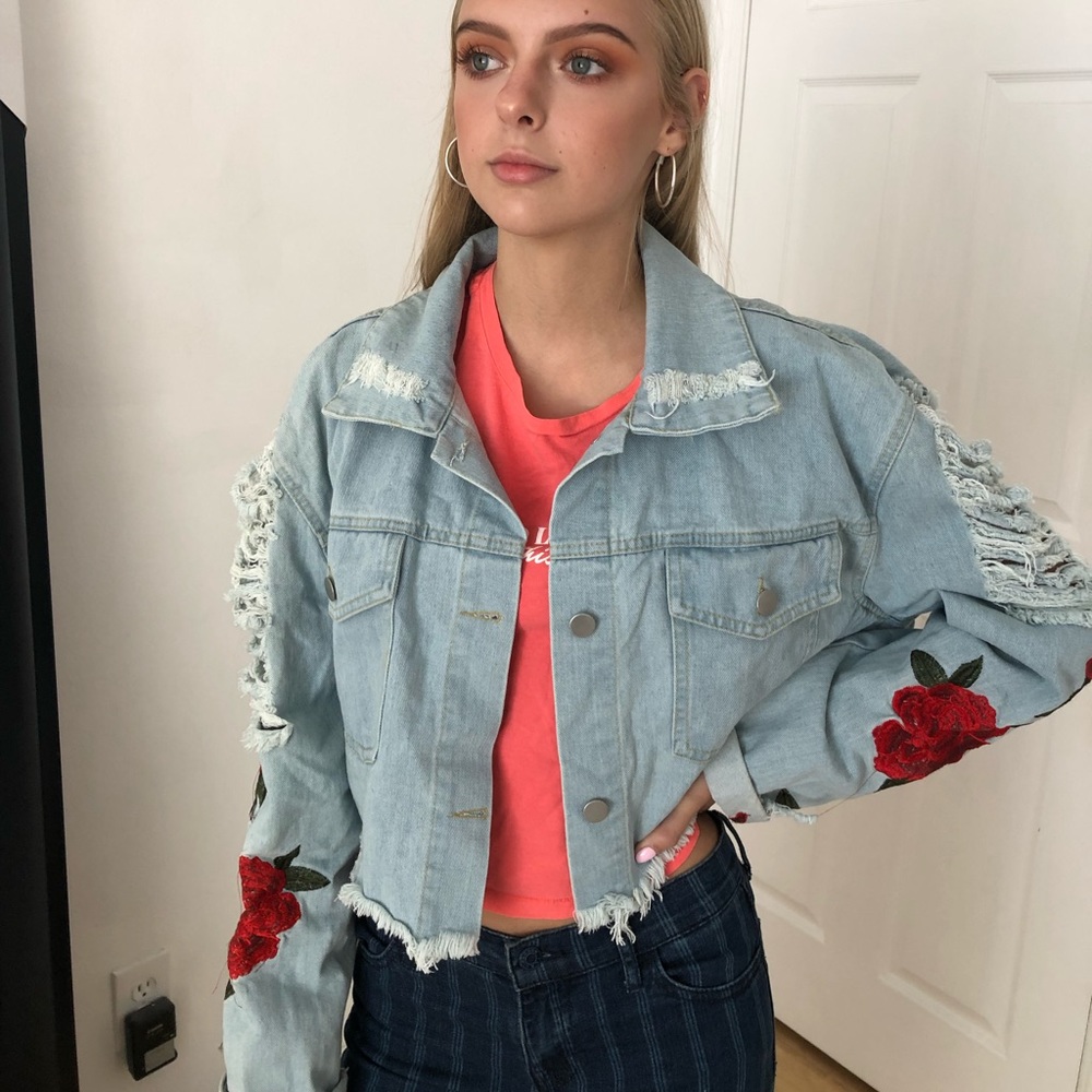 distressed denim jacket with rose embroidery